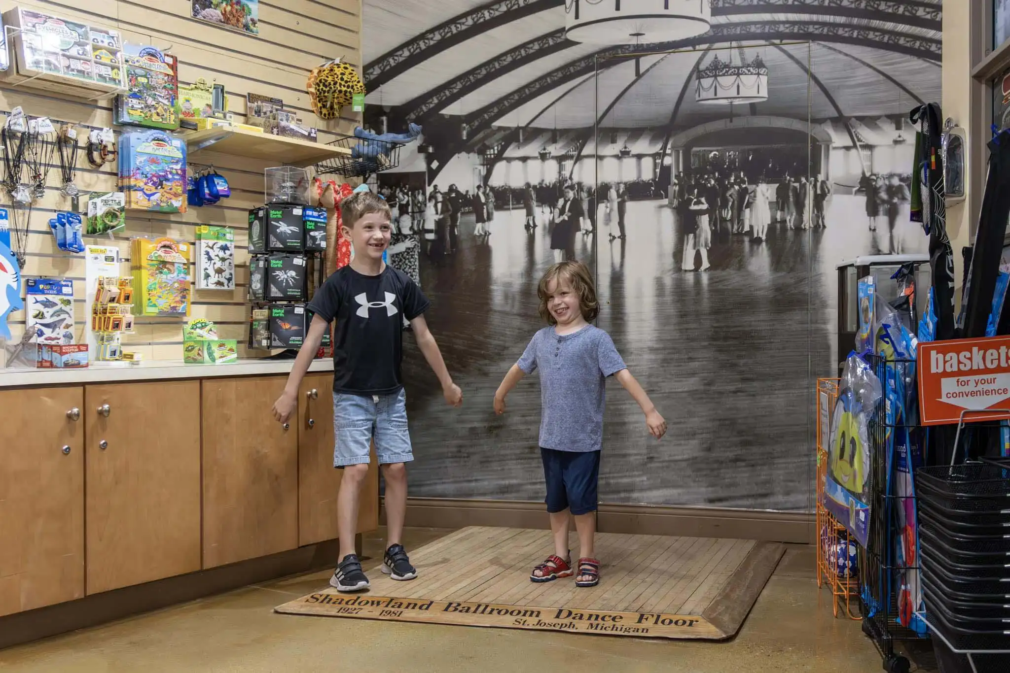 kid standing on the original ballroom dance floor.